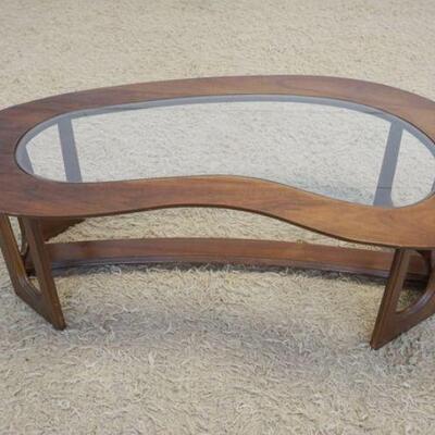 1202	MIDCENTURY MODERN WALNUT KIDNEY SHAPED COFFEE TABLE W/INSET GLASS TOP, APPROXIMATELY 50 IN X 28 IN X 15 IN HIGH
