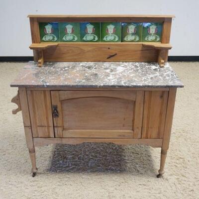1198	CONTINENTAL ONE DOOR MARBLE TOP STAND W/INSET TILE RACK SPLASH, APPROXIMATELY 46 IN X 19 IN X 44 IN HIGH
