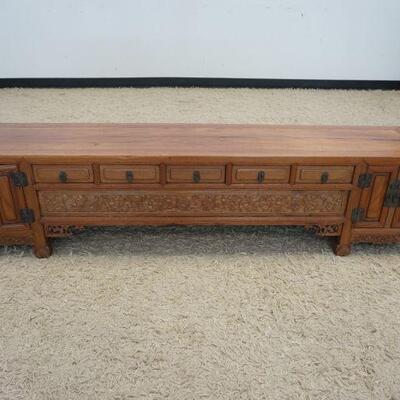 1043	ANTIQUE TEAK 5 DRAWER 4 DOOR LOW CABINET W/FRETWORK CUT OUT & CARVED PANELS, APPROXIMATELY 65 IN X 14 IN X 15 IN HIGH
