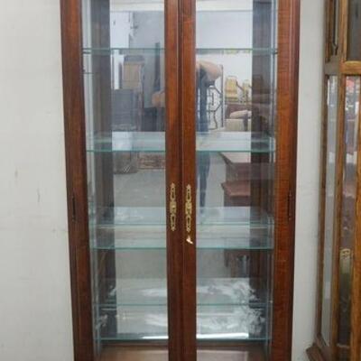 1026	HOWARD MILLER MIRROR BACK DISPLAY CABINET, APPROXIMATELY 34 IN X 15 IN X 77 IN HIGH
