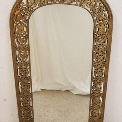 1066	LARGE BRONZE FRAMED WALL MIRROR W/FRET BORDER HAVING GRAPE CLUSTERS, LEAVES & SHIELDS, APPROXIMATELY 22 IN X 40 1/2 IN HIGH
