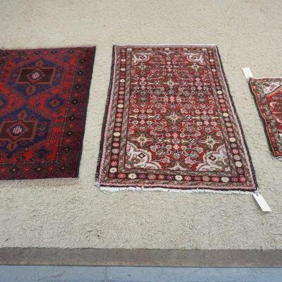 1054	3 SMALL PERSIAN THROW RUGS, LARGEST IS APPROXIMATELY 4 FT 6 IN X 3 FT
