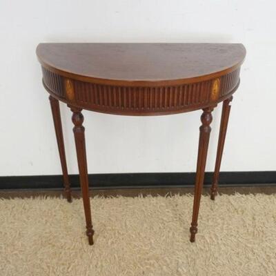 1191	MAHOGANY DEMILUNE TABLE W/SHELL INLAY & REEDED LEGS, APPROXIMATELY 37 IN X 17 IN X 34 IN HIGH
