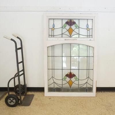 1009	LARGE ANTIQUE DOUBLE STAIN GLASS WINDOW W/ADJUSTABLE TRANSOM WINDOW ABOVE, APPROXIMATELY 23 1/4 IN X 69 IN HIGH
