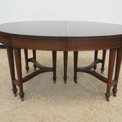 1021	MAHOGANY OVAL DINING TABLE W/REEDED LEGS & 3 LEAVES, TABLE IS 50 IN X 64 IN X 30 1/4 IN HIGH, LEAVES ARE 12 IN WIDE
