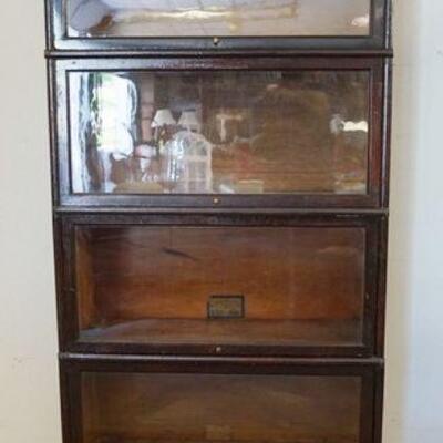 1011	4 SECTION MAHOGANY BOOKCASE, MACEY & GLOBE WERNICKE, APPROXIMATELY 34 IN X 14 IN X 76 IN HIGH
