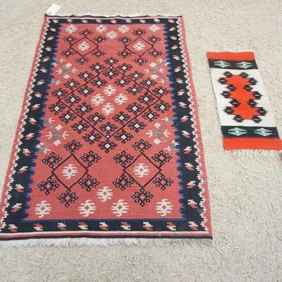 1052	2 SMALL NATIVE RUGS, LARGEST IS APPROXIMATELY 5 FT X 3 FT 2 IN
