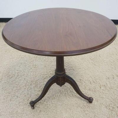 1008	ANTIQUE VICTORIAN ROUND WALNUT TOP TABLE ON A PAINT DECORATED ADJUSTABLE METAL BASE, APPROXIMATELY 28 IN X 28 IN HIGH
