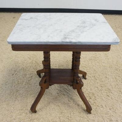 1182	WALNUT VICTORIAN MARBLE TOP STAND, APPROXIMATELY 26 IN X 8 IN X 31 IN HIGH
