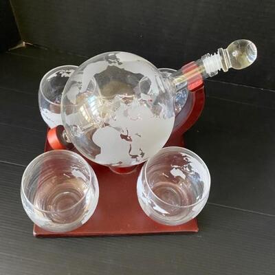 Spinning globe decanter with glasses
See 