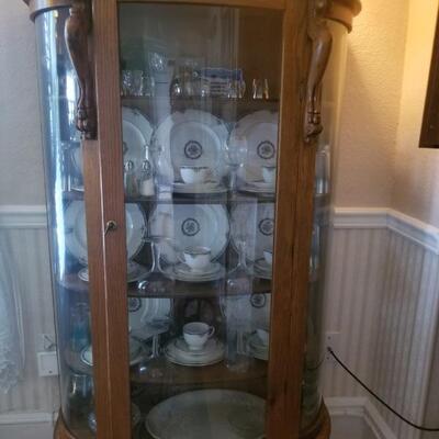 Antique Griffon bowfront china cabinet