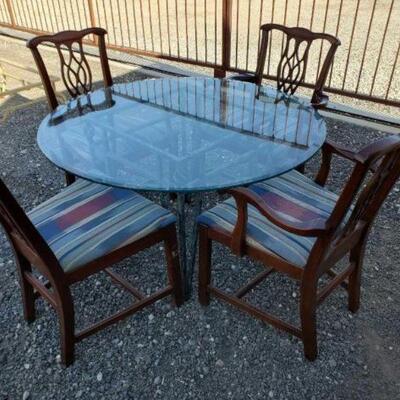 #10494 â€¢ Glass Top Dinning Room Table And 4 Chairs: Table Measures Approx: 48" x 29" Chairs Measure Approx: 25" x...