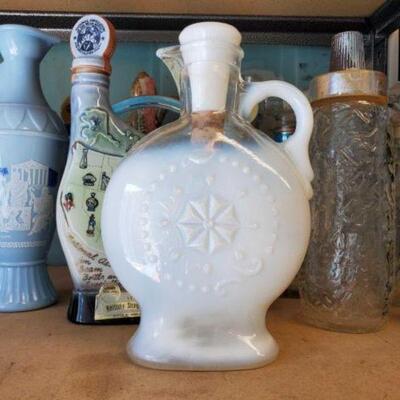 #3012 â€¢ 11 Vintage Collectible Bottles: Includes Jim Beam and Kentucky Tavern Bottles. 