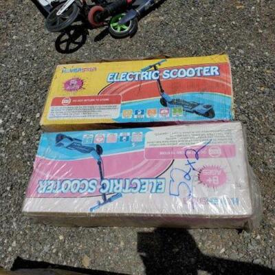 #52 â€¢ 2 New In Box Hoverstar Electruc Scooters