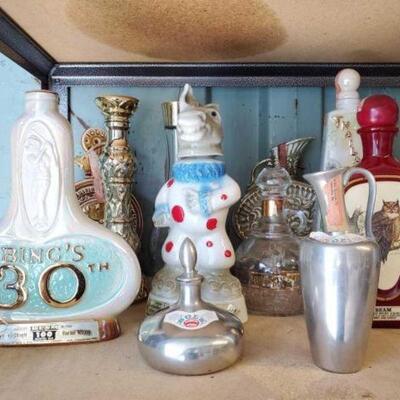 #3010 â€¢ 11 Vintage Collectible Bottles: Includes Jim Beam and Bols Bottles. 