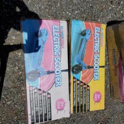 #50 â€¢ 2 New In Box Hoverstar Electruc Scooters