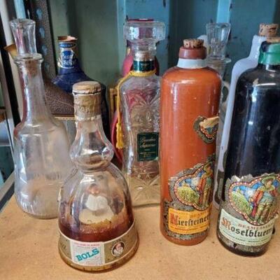 #3054 â€¢ 12 Vintage Collectible Bottles: Includes Bols and Jim Beam Bottles