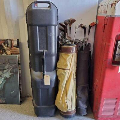 #5910 â€¢ 2 Sets Of Golf Clubs And 1 Golf Club Travel Case
