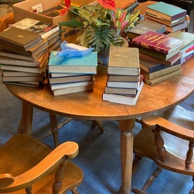 Table w/2 leaves & 4 chairs. books have been moved