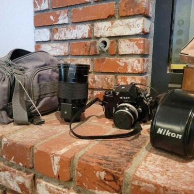 332 • Camera Bag And Lenses. 