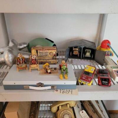 #1264 • Tin Toys And More