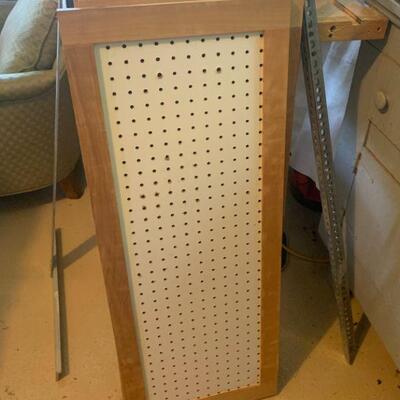Peg Board that Hangs and Turns to Use Both Sides