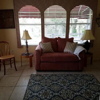 rug, lamp, end tables, picture, window treatments