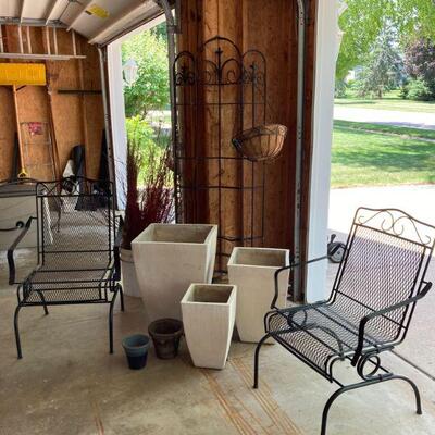 wrought iron spring chairs and planters