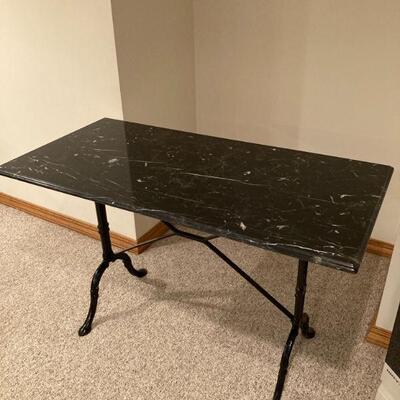wrought iron base with marble top table