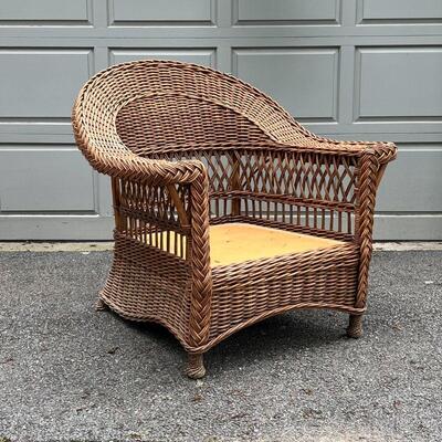 PALECEK WICKER ARM CHAIR | Appears in excellent condition, no cushion; h. 37 x 37 x 37 in.