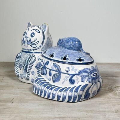 (4pc) MISC. CAT FIGURES | Including a paper mache weighted cat, an Italian faience cat, and a pair of floral decorated ceramic cats;...
