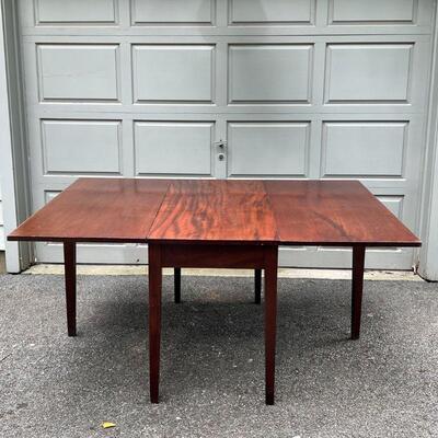 DROP LEAF TABLE | Richly colored and beautifully figured wood, h. 29 x 22 x 48 in., each leaf 21 in. [old repair at one corner]
