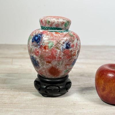 (4pc) MISC. DECORATIVE ITEMS | Including a Staffordshire dog, carved wooden apple, ceramic frogs, miniature lidded jar (h. 4-1/2 in.)