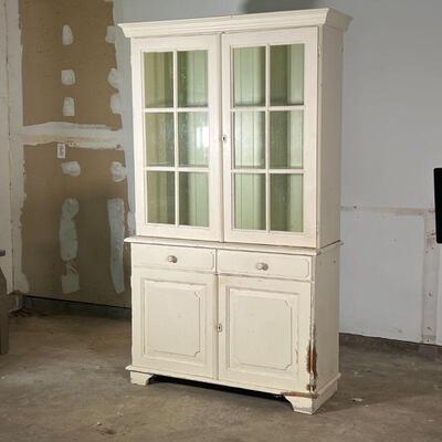COUNTRY PAINTED CABINET | Double glazed doors over two drawers and cabinet doors, white paint with green painted interior; h. 76 x 43-1/2...