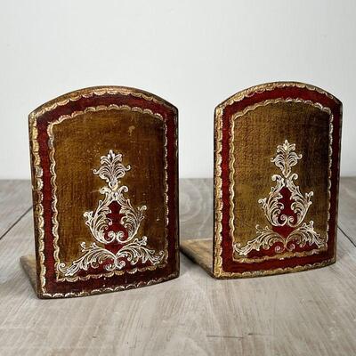 (4pc) GILT DECORATIVE ITEMS | Including a pair of fancy bookends painted with acanthus decoration, a gilt carved miniature picture frame...