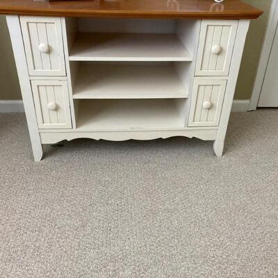 White cabinet with natural finish top measures 39.5