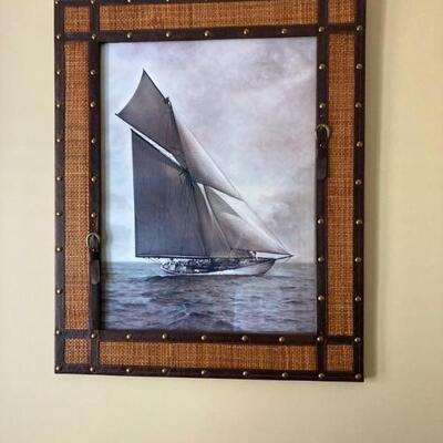 Sailboat print.  Nicely framed with burlap and leather touches.