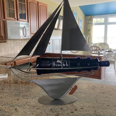 Sail boat wine bottle holder.  Who doesn't need one of these?