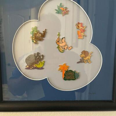 Several Disney Pin Collections