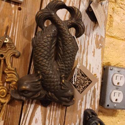 Antique brass door knocker dolphin