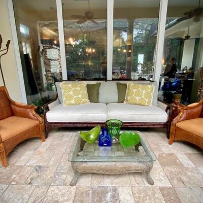 Tommy Bahama caned sofa and leather chairs, and antique coffee table