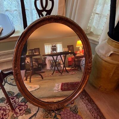 vintage oval mirror with gold frame