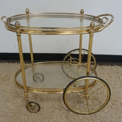 1084	BRASS TEACART W/REMOVABLE GLASS SERVING TRAY TOP, APPROXIMATELY 29 IN X 17 IN X 26 IN
