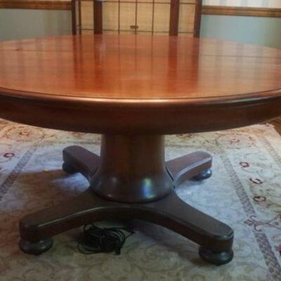 1102	SOLID MAHOGANY 60 IN ROUND EXTENSION TABLE WITH 5-12 IN LEAVES 
