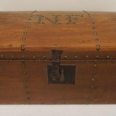 1229	SMALL PINE ANTIQUE DOME CHEST W/ BRASS TACK ACCENTS & INITIALS LINED W/ ANTIQUE NEWSPAPER. APP. 11 1/4 IN X 21 IN X 9 3/4 IN H 
