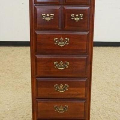 1064	AMERICAN DREW LINGERE CHEST OF DRAWERS HAVING 7 DRAWERS IN CHERRY FINISH, APPROXIMATELY 19 IN X 16 IN X 52 IN HIGH
