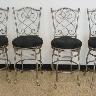 1070	BAR STOOLS LOT OF 4, FANCY IRON BAR STOOLS W/UPHOLSTERED SEATS THAT SWIVEL, APPROXIMATELY 43 IN HIGH
