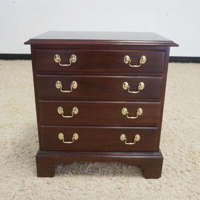 1045	KNOB CREEK 4 DRAWER MINIATURE MAHOGANY CHEST ON BRACKET FEET, APPROXIMATELY 23 IN X 15 IN X 25 IN HIGH

