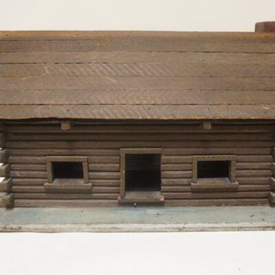 1245	LARGE PRIMITIVE SCALE MODEL OF A LOG CABIN W/HINGED ROOF, APPROXIMATELY 15 IN X 33 1/2 IN X 18 IN HIGH
