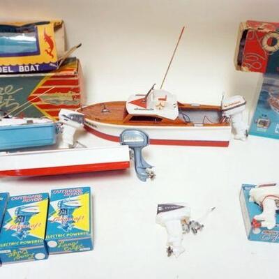 1138	COLLECTION OF MODEL BOATS WITH MOTORS, EVIN RUDE, MERCURY OUTBOARD MOTOR, JOHNSON, ETC. BOXES ARE EMPTY
